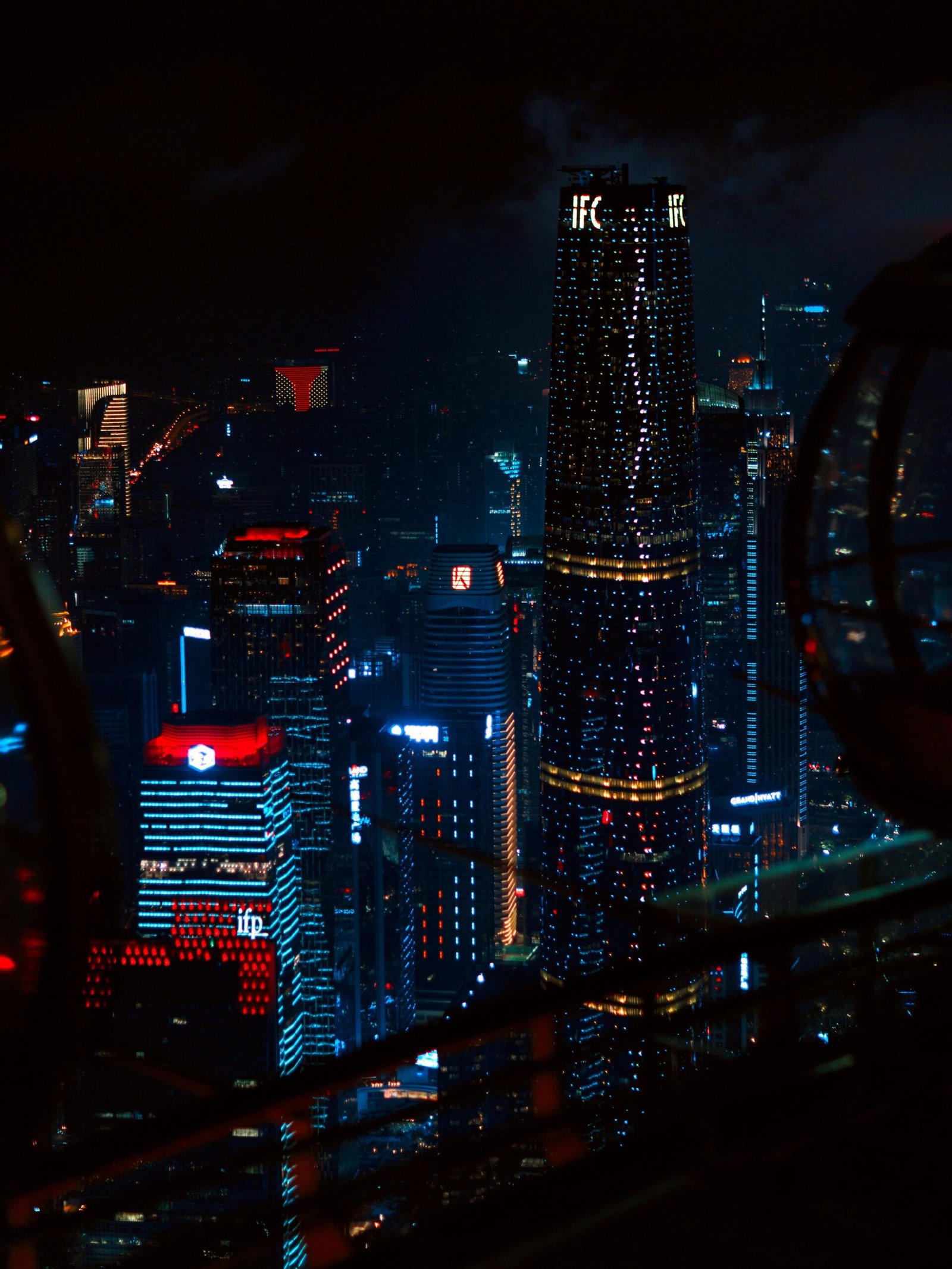 Stunning nighttime view of Guangzhou's city skyline featuring illuminated skyscrapers.